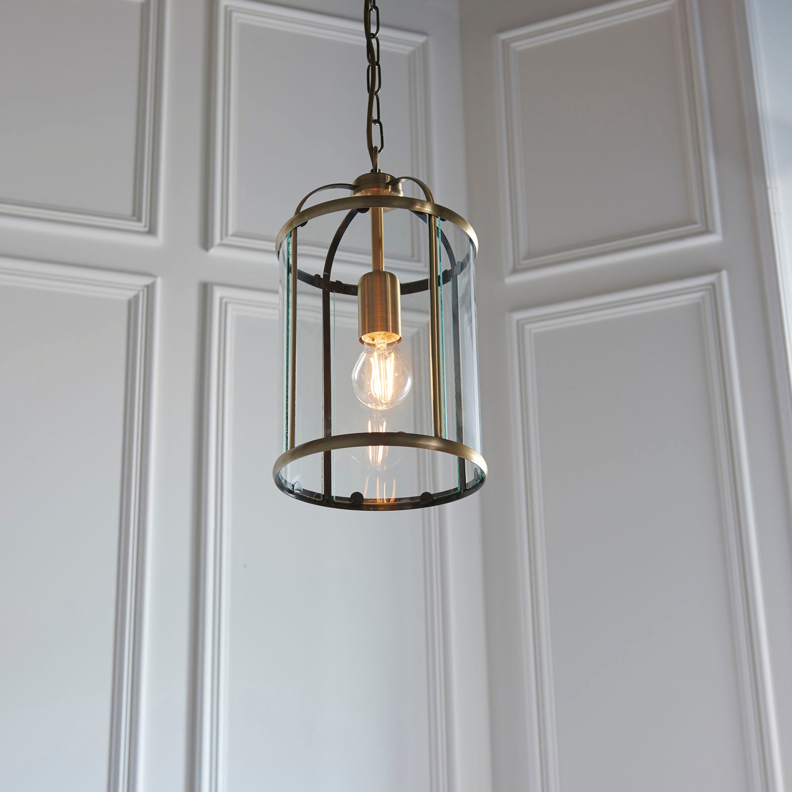 Lambeth 1-Light Adjustable Antique Brass Pendant with Clear Glass