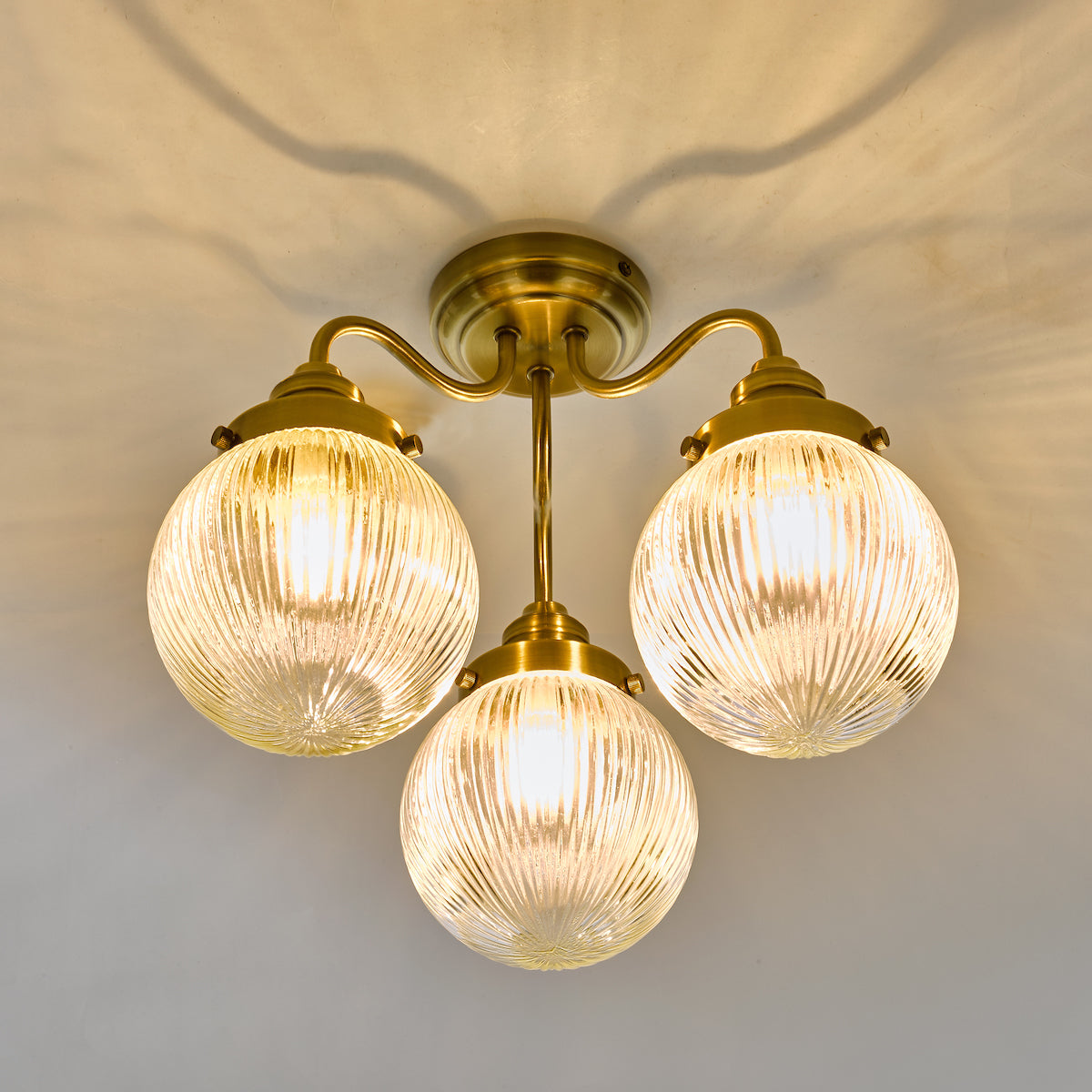 Tamara 3 Light Bathroom Semi Flush Antique Brass Ribbed Glass IP44